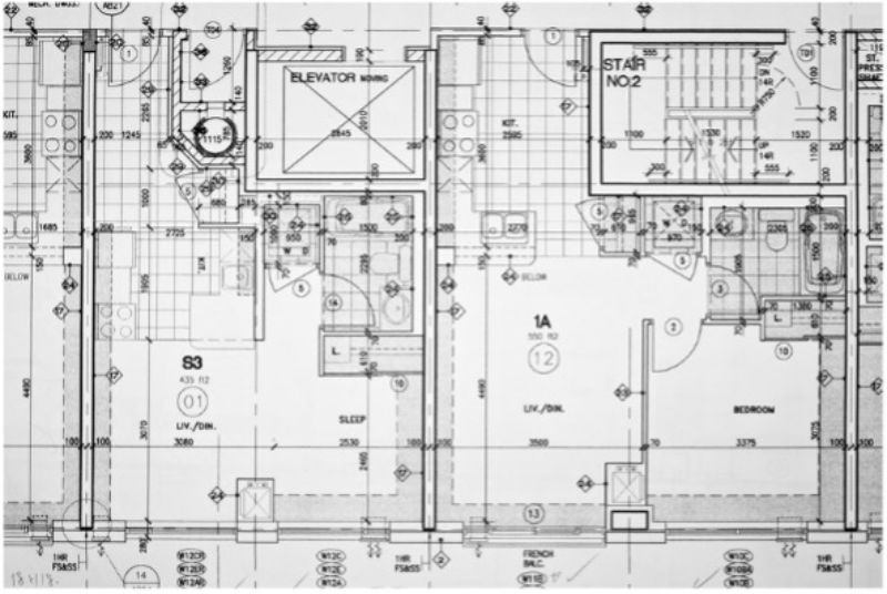 quantity-surveyor-building-blueprints-black-and-white-min